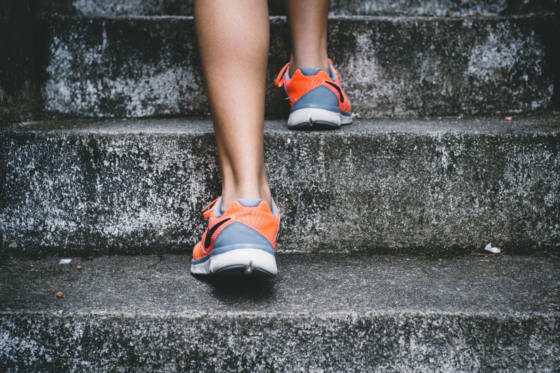 Women sport shows walking up the stairs